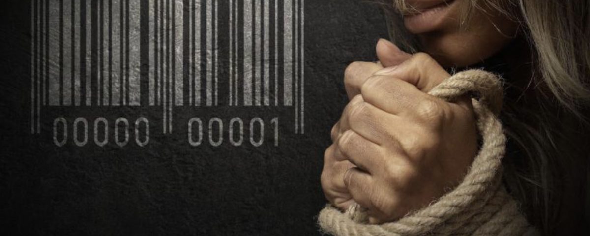 A barcode next to a person tied up.