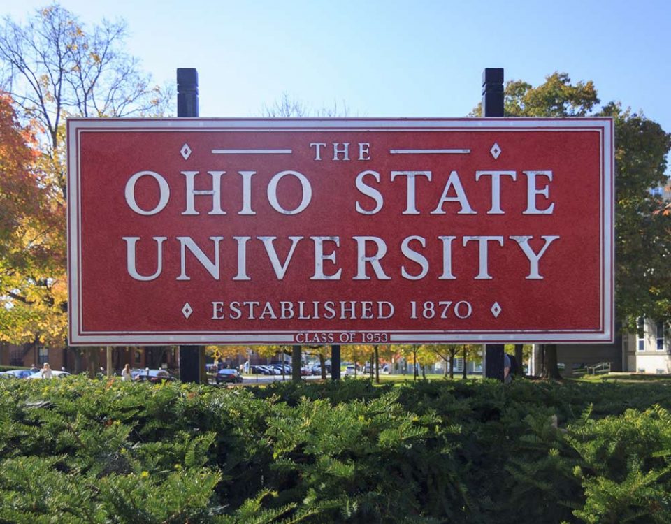 A large rectangular red sign that reads “THE OHIO STATE UNIVERSITY, ESTABLISHED 1870, CLASS OF 1953.”